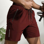 MotionCore Men's Sports Shorts with Zipper Pockets and Drawstring