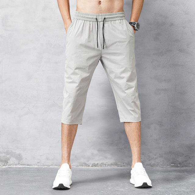 CoastFlex Men's Quick-Dry Long Swim Shorts with Comfortable Fit