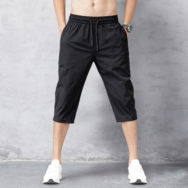 CoastFlex Men's Quick-Dry Long Swim Shorts with Comfortable Fit