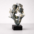Decorative couple sculpture in polyresin