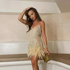 LumiBelle Sequin Party Dress with Feather Hem and Spaghetti Straps